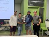 The IntelliPay winning team. Jason (second from left) and Conor hold the trophy.